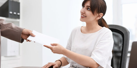 employee receiving paycheck