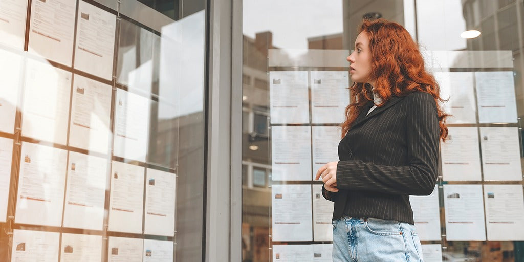 young lady looking at job postings