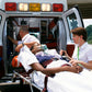 Office Safety Streaming Woman Going into Ambulance